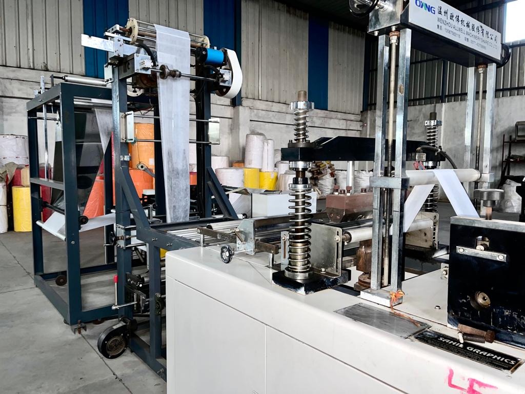 V.R Industries loop handle ultrasonic welding line
